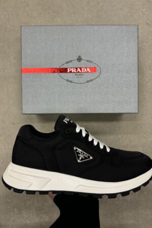 Prada sneakers | zwart/wit